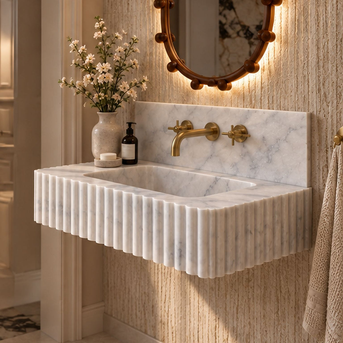 Wall mounted Carrara White marble sink with natural grey veining