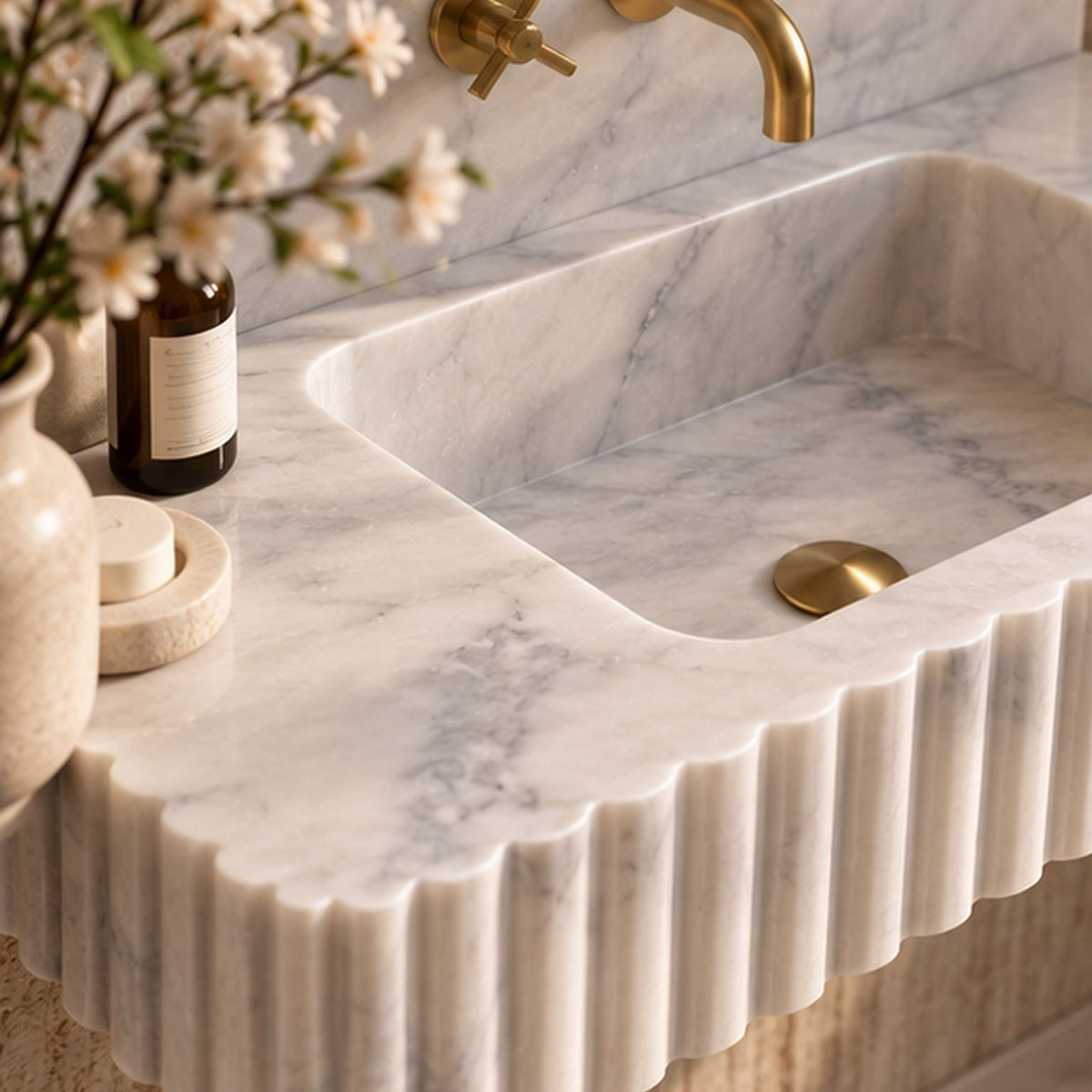 White marble floating bathroom sink with fluted detailing