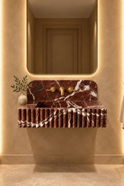 Nova109 Rosso Levanto marble fluted sink with integrated basin and matching burgundy marble backsplash